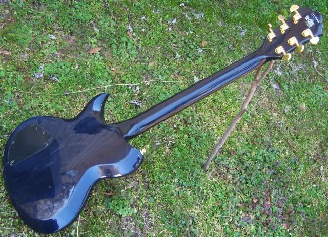 SOLD*- Washburn Idol WI-64DL with bag! VCC tone controls, Buzz Feiten tuning  system, setup light with Ernie Ball Super . Booboo on headstock. $199.99